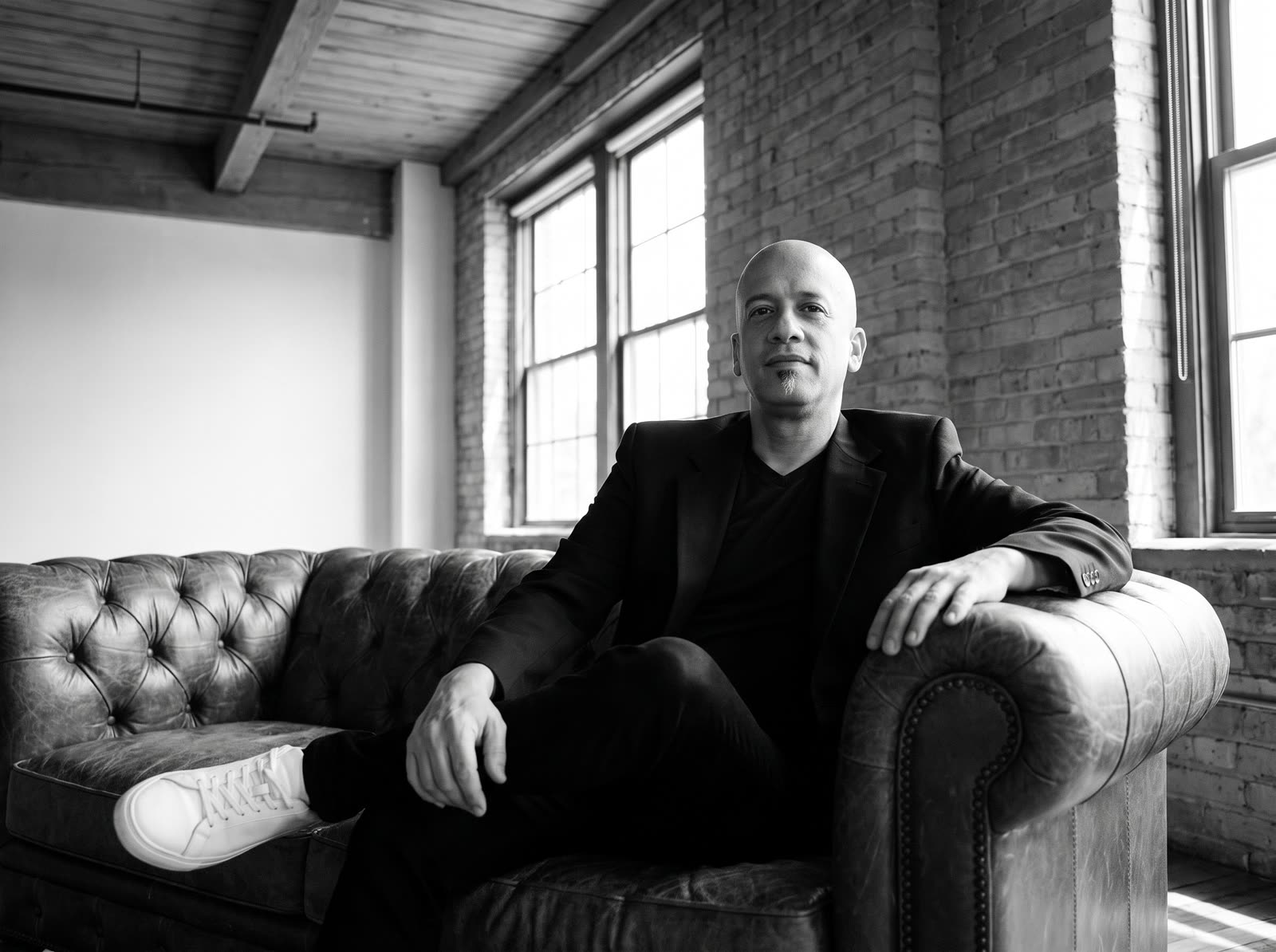 Arturo Ramírez Ríos, founder and CEO of AR Motion Lab, seated in an industrial loft